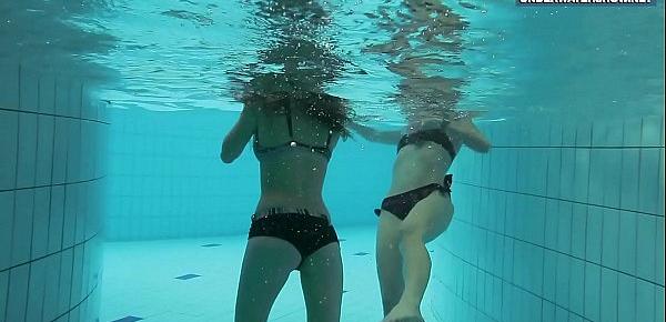  Two super hot teens in the pool